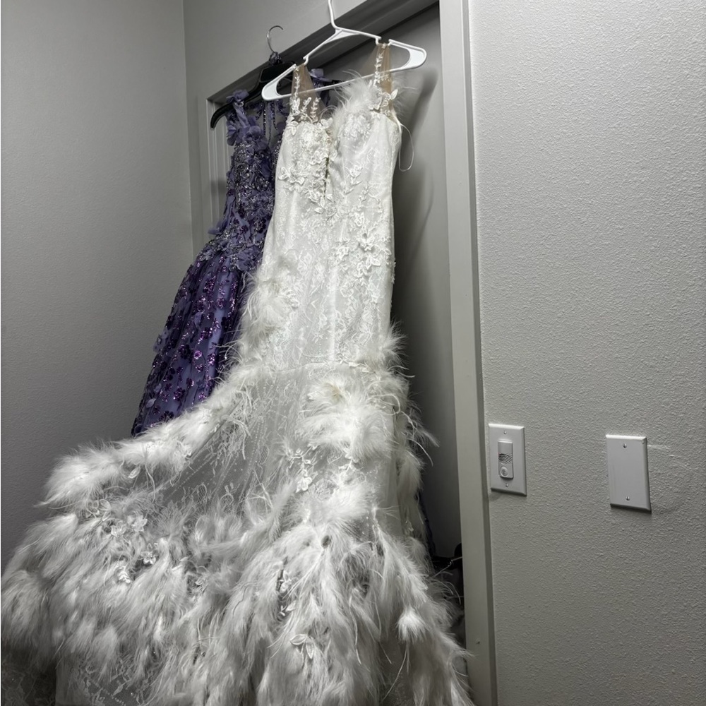 Elegant White Feathered Gown worn once for a beauty pageant